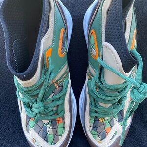 New Puma black fives Green and Orange Athletic Shoes with Dynamic Design